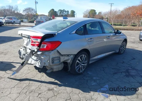 2021 Honda Accord Hybrid z USA, uszkodzony, nr VIN 1HGCV3F1XMA013159